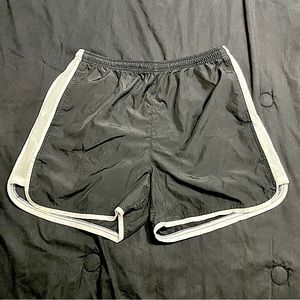 Aspire medium quick dry black and white shorts.